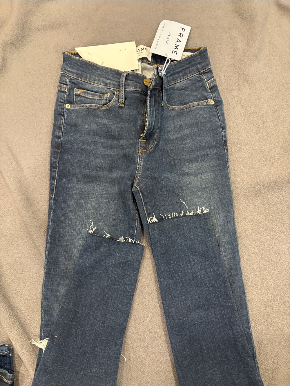 Frame Denim Skinny Jeans in Medium Blue with Knee Distress
